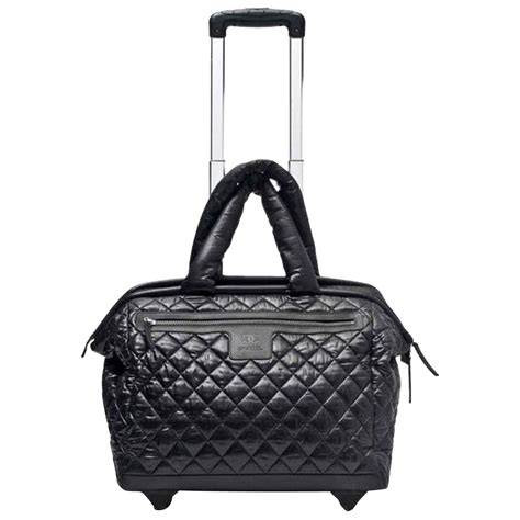 chanel travel bag with wheels|More.